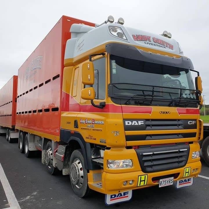 Front of a yellow DAF CF cab with yellow H boards